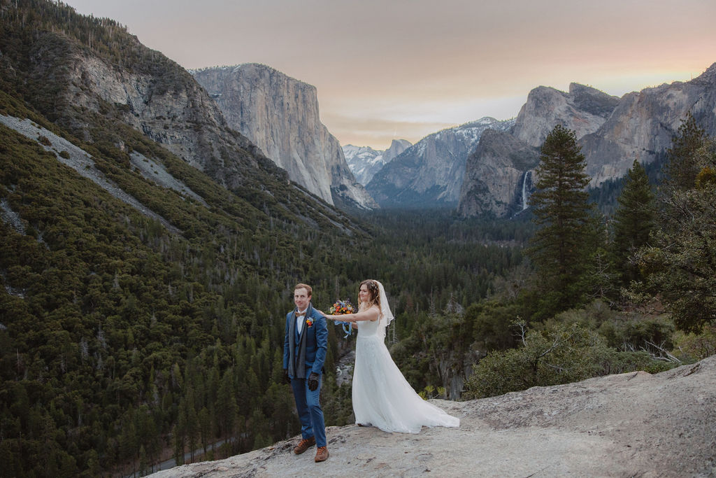 Bride and groom have first look at sunrise at Tunnel View