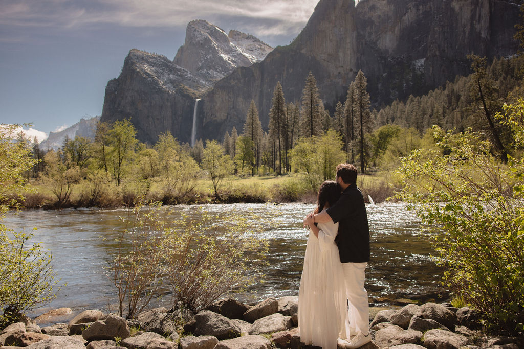 Couple takes in the view in Yosemite National Park