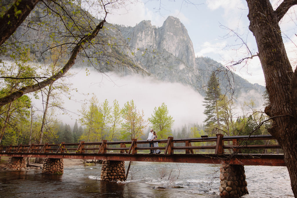 Couple on a bridge in Yosemite National Park