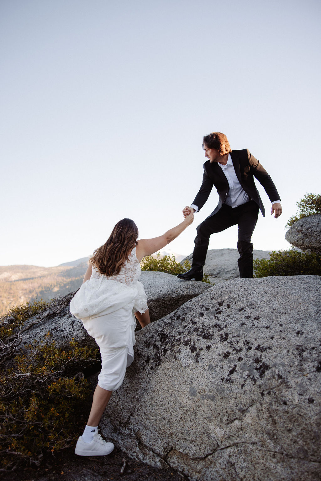Bride and groom hiking in Yosemite elopement shoes