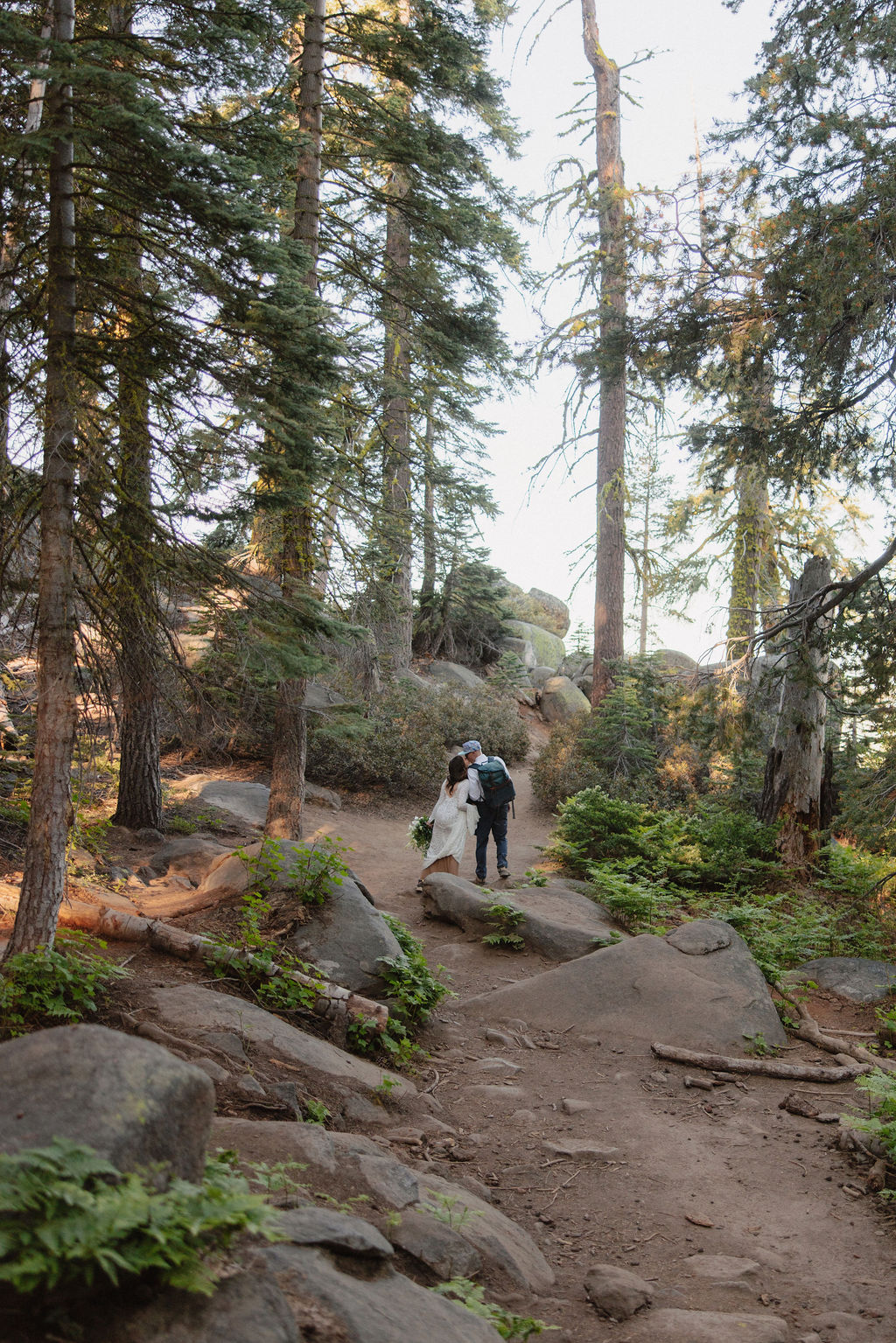 Couple hiking to Taft Point during their Upper Yosemite elopement